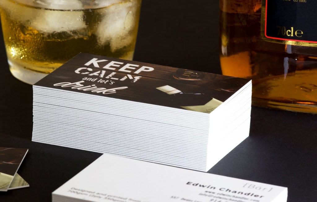 Stack of duplex business cards showing their thickness