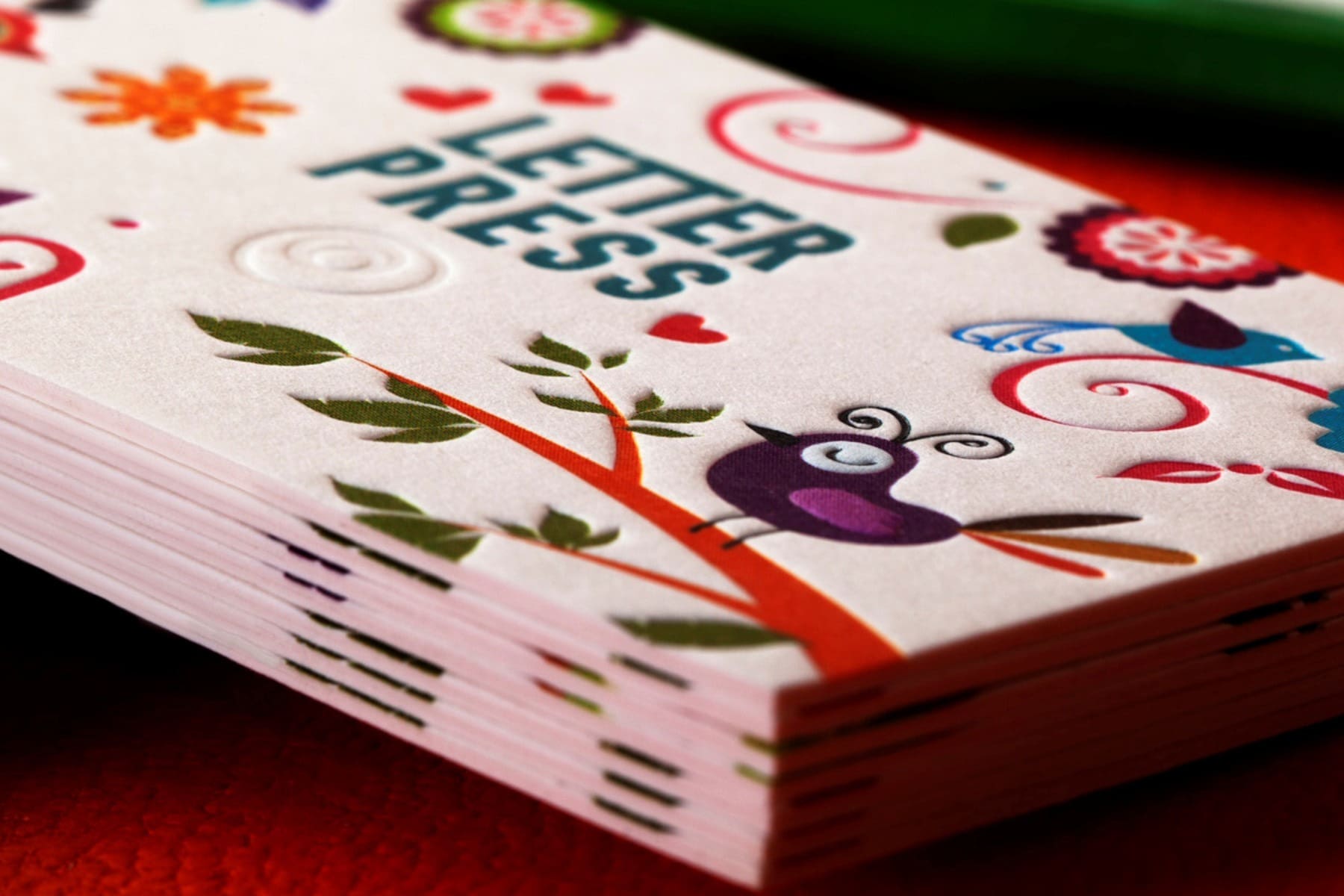 Thick bonded business cards combining printed colour and letterpress