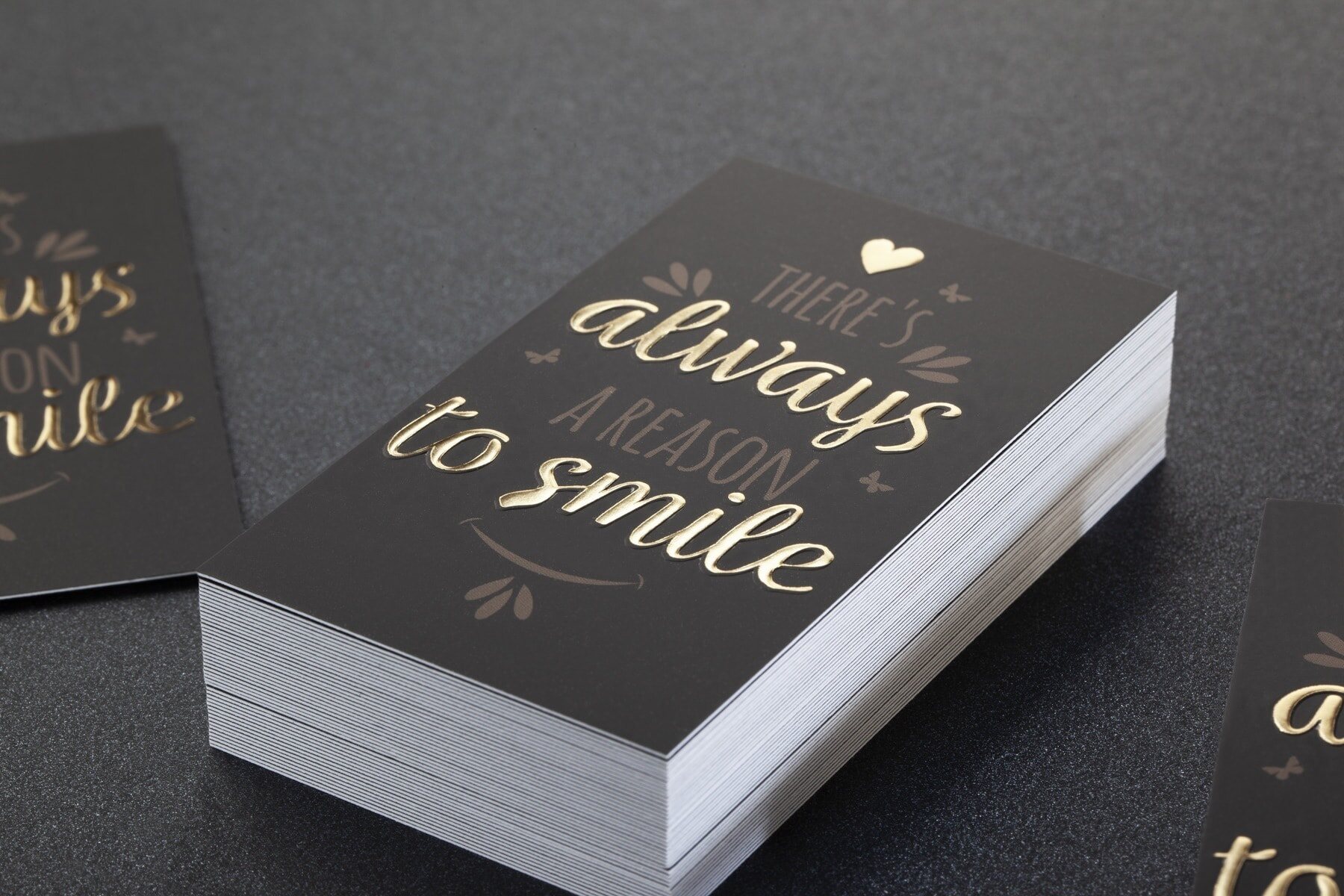 Finished laminated business cards with specialist detail