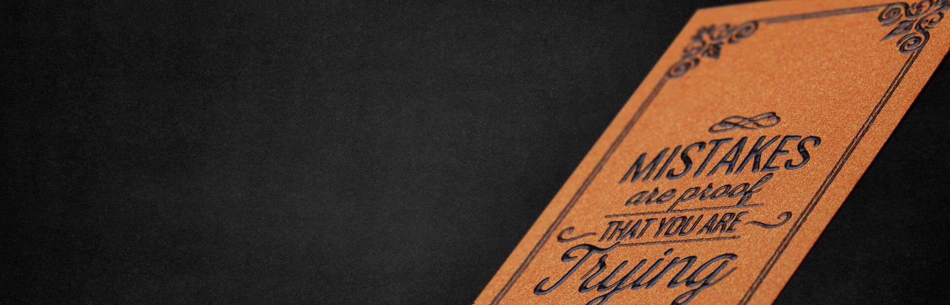 Close view of raised thermographic print on business cards