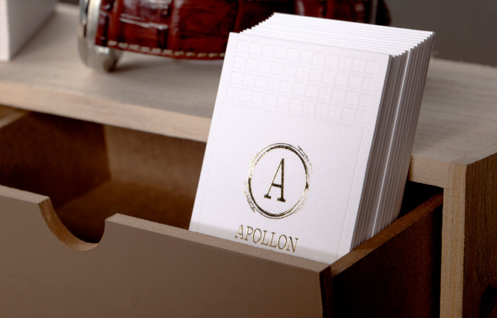 Angled view of the gold-foil and blind-impression house sample