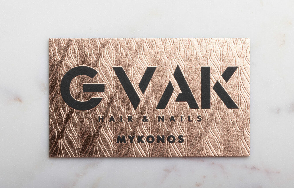 GVAK Mykonos cards showing the rose-gold face and black edge