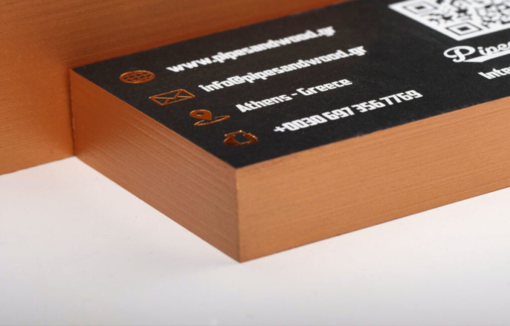 Stack of Pipes & Wood cards with a metallic bronze painted edge