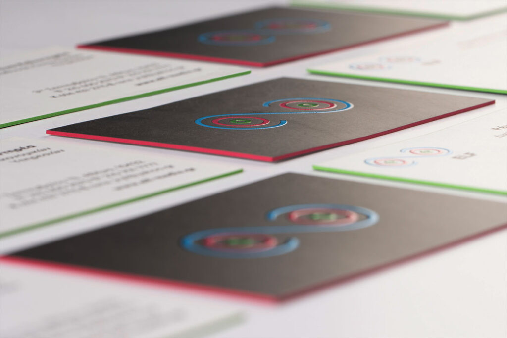 Front and reverse of Anagram cards with raised 3D UV on both sides