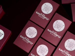 A spread of Butterfly Triplex cards showing the circular translucent window