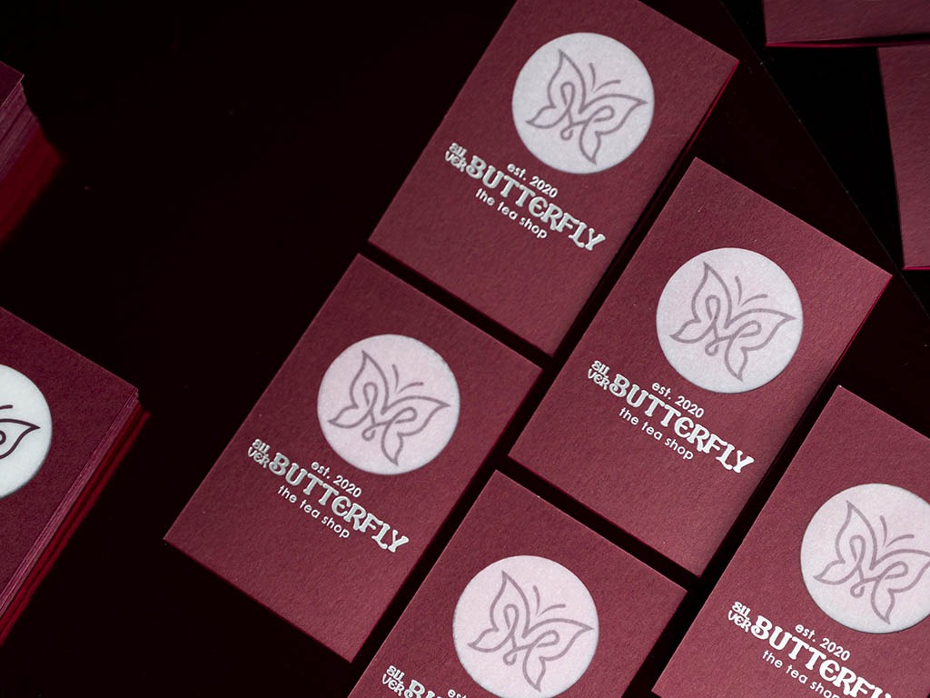 A spread of Butterfly Triplex cards showing the circular translucent window