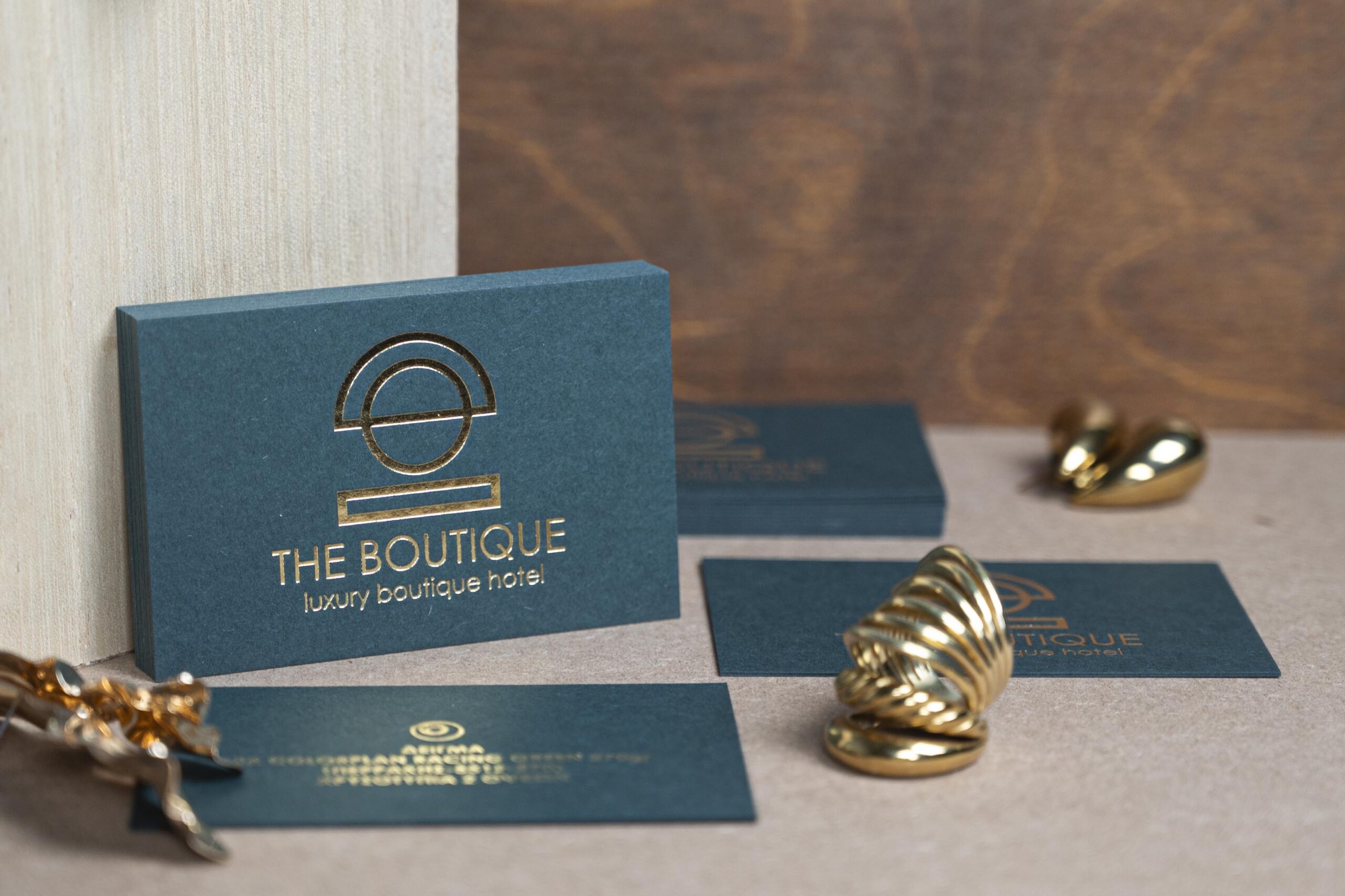 Colorplan Racing Green business cards with gold and white hot foil