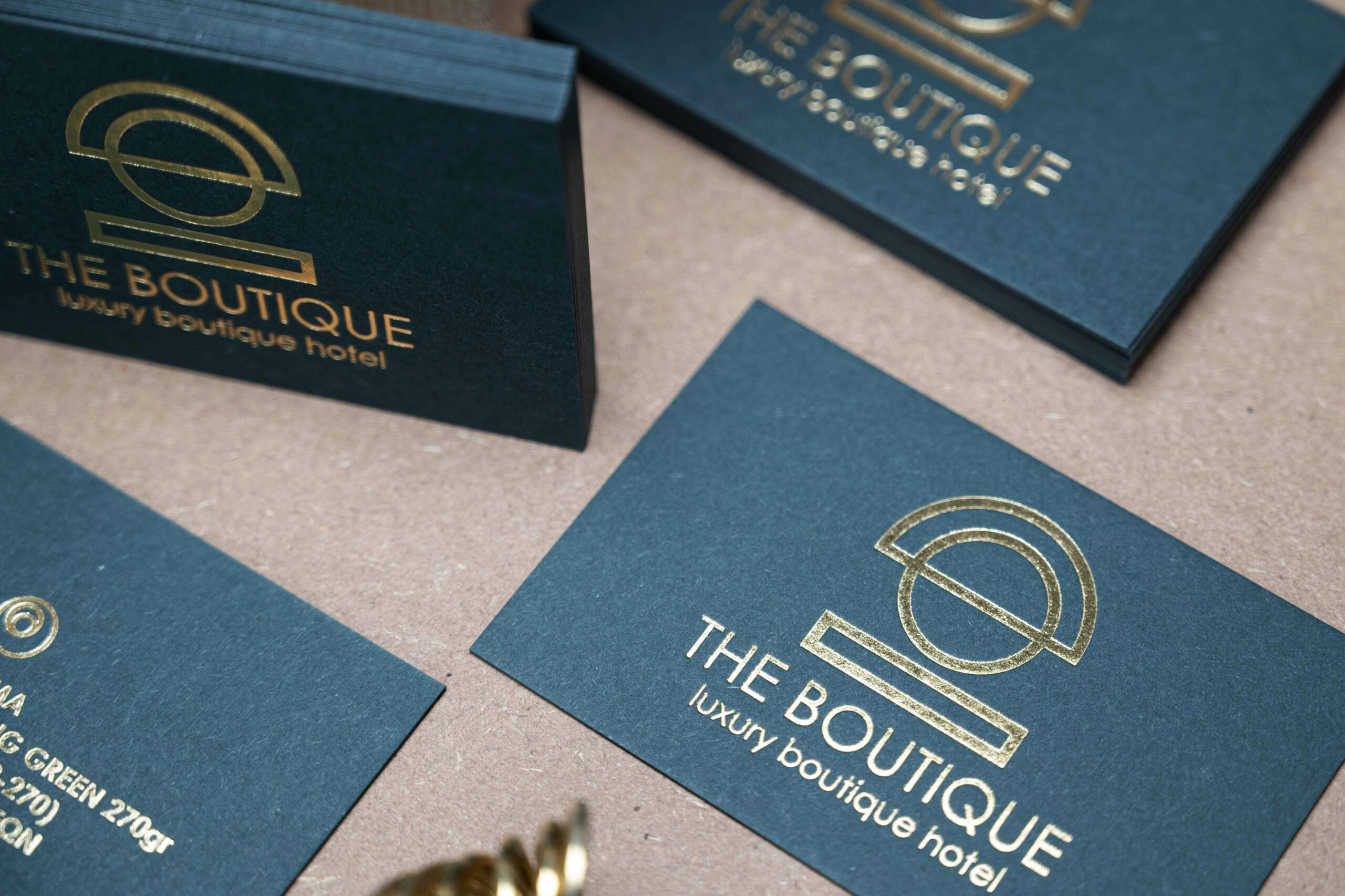 Layered Colorplan Racing Green cards with a visible coloured edge and gold hot foil