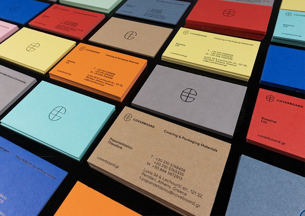 Stacked Coverboard cards showing their solid coloured thickness