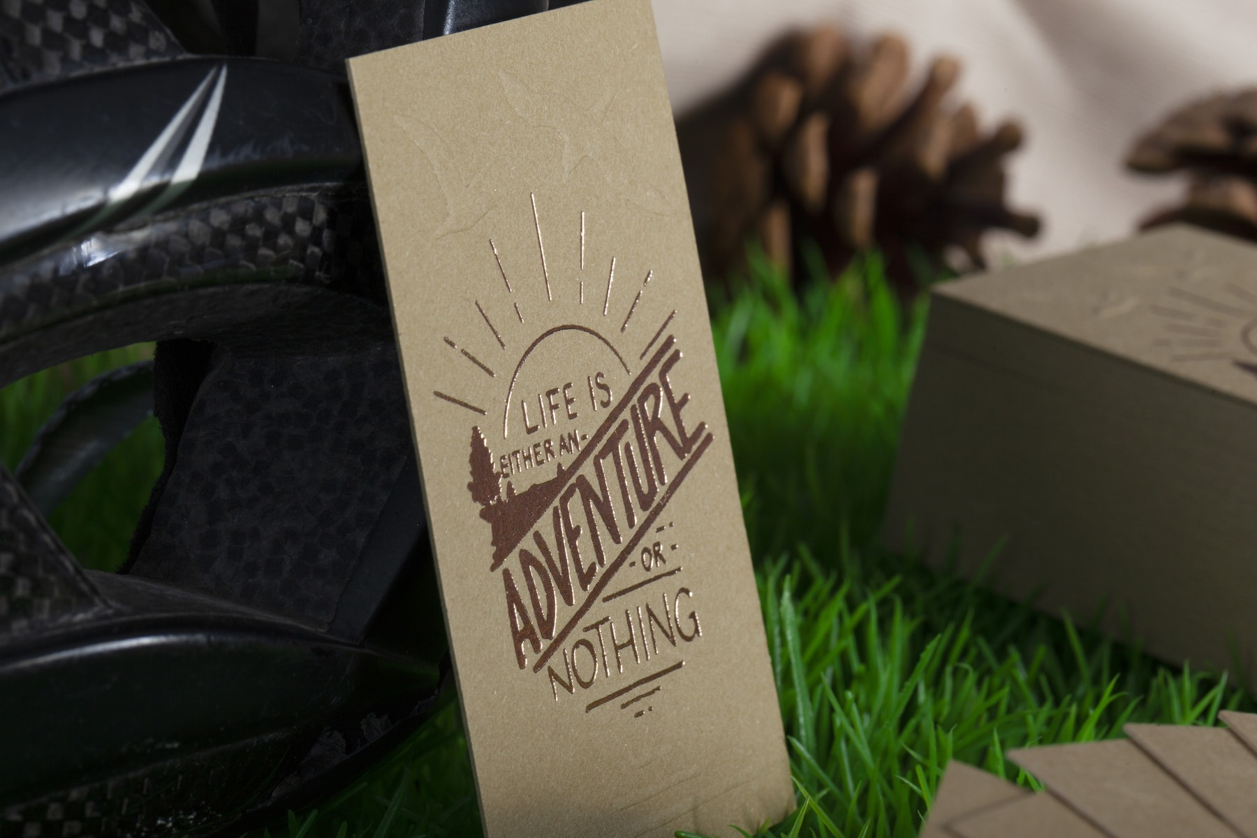 Materica Kraft sample card with rose-gold hot foil and blind embossing
